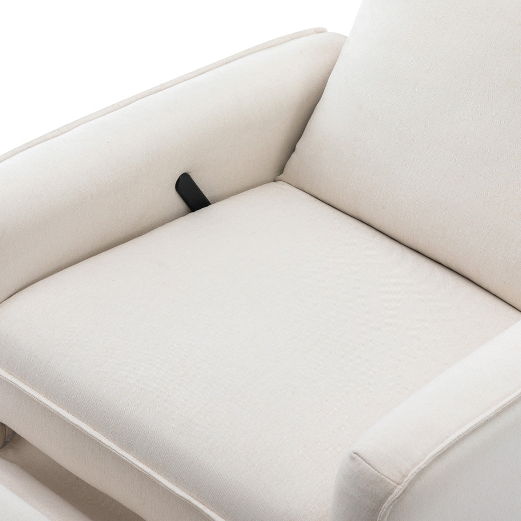 Closeup of the DaVinci's Penny Recliner And Swivel Glider seat in -- Color_Performance Cream Eco-Weave