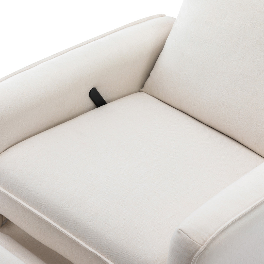Closeup of the DaVinci's Penny Recliner And Swivel Glider seat in -- Color_Performance Cream Eco-Weave
