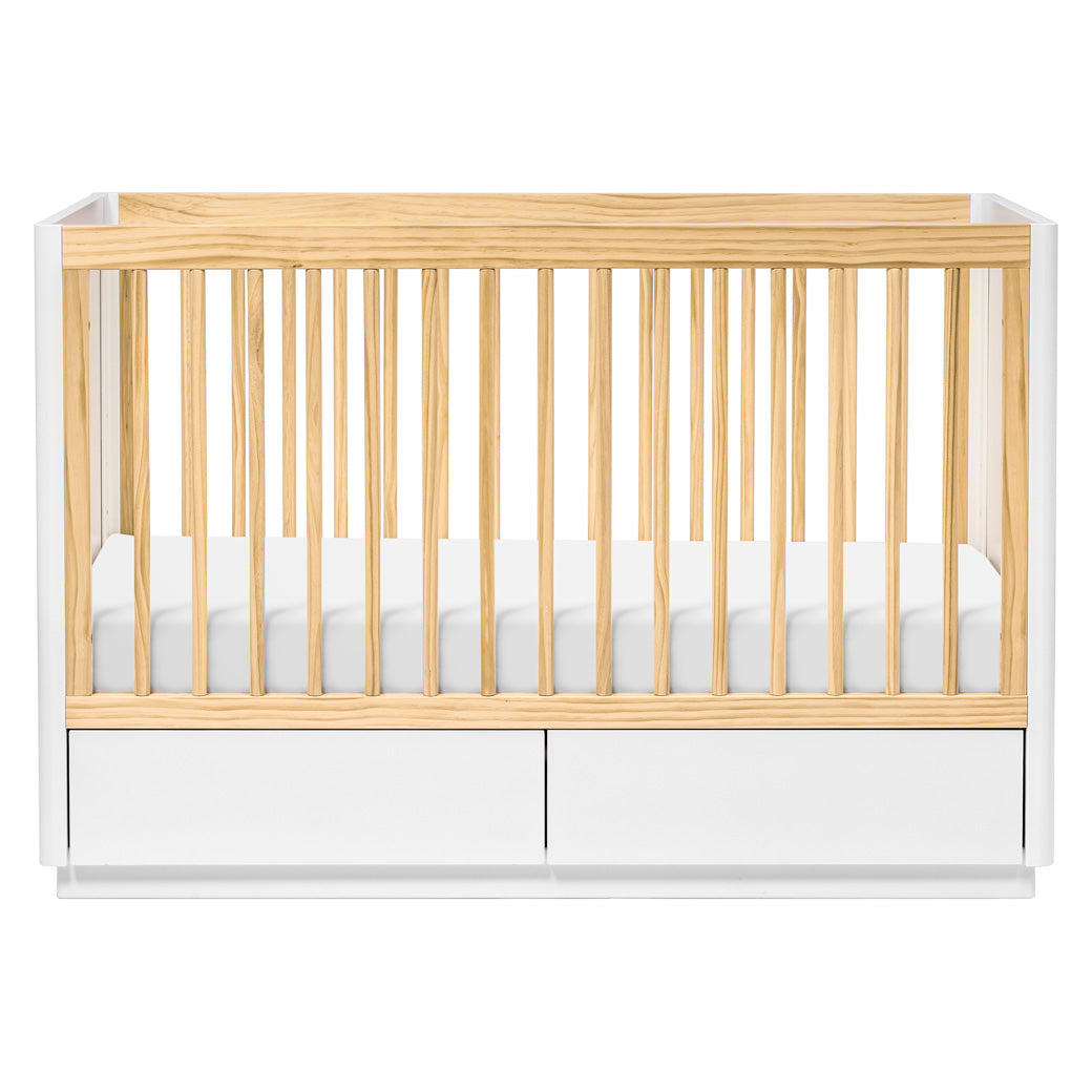 Front view of The Babyletto Bento 3-in-1 Convertible Storage Crib with Toddler Bed Conversion Kit in -- Color_White Natural