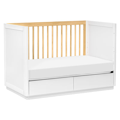 The Babyletto Bento 3-in-1 Convertible Storage Crib with Toddler Bed Conversion Kit converted into day bed in -- Color_White Natural