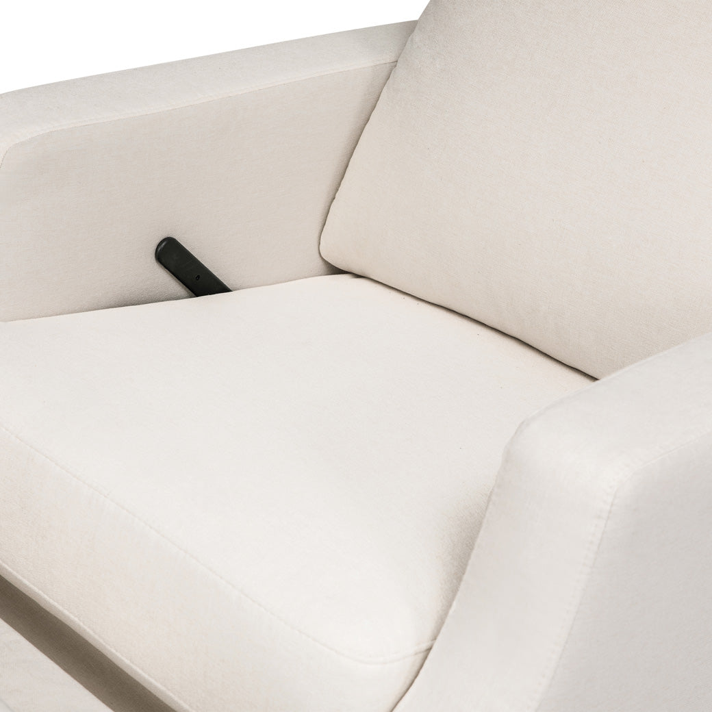Closeup of the seat of the Namesake's Crewe Recliner & Swivel Glider in -- Color_ Performance Cream Eco-Weave With Metal Base