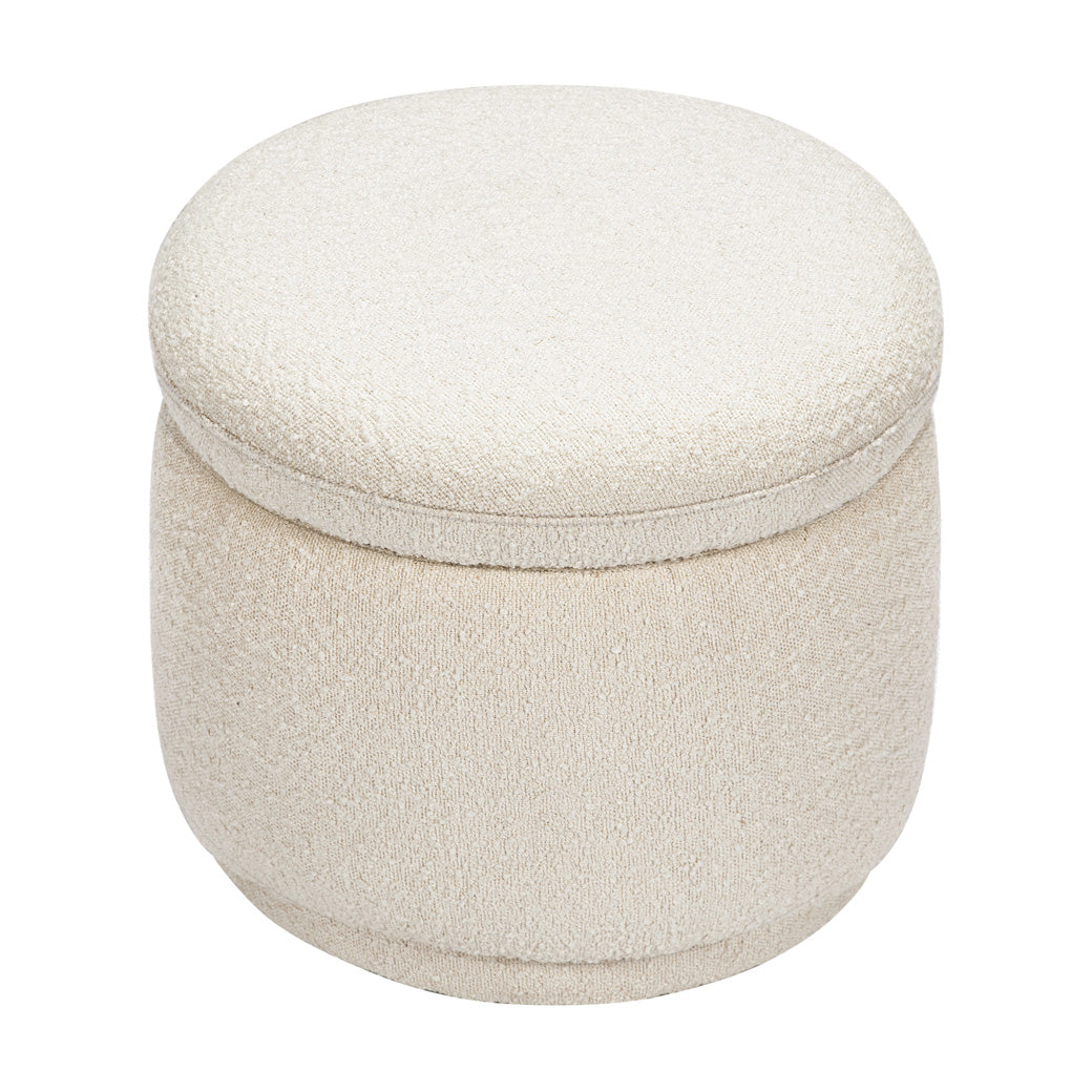 Angled view of The Babyletto Enoki Storage Ottoman in --Color_Ivory Boucle