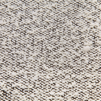 Close up of the material of the Ubabub Arc Electronic Recliner and Swivel Glider -- Color_Black White Boucle