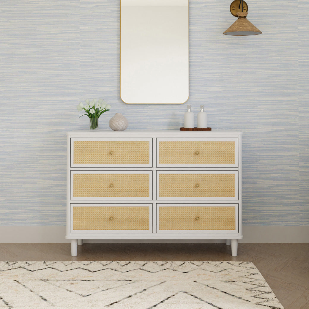 Front view of Namesake's Marin 6 Drawer Dresser under a mirror in -- Color_Warm White/Honey Cane
