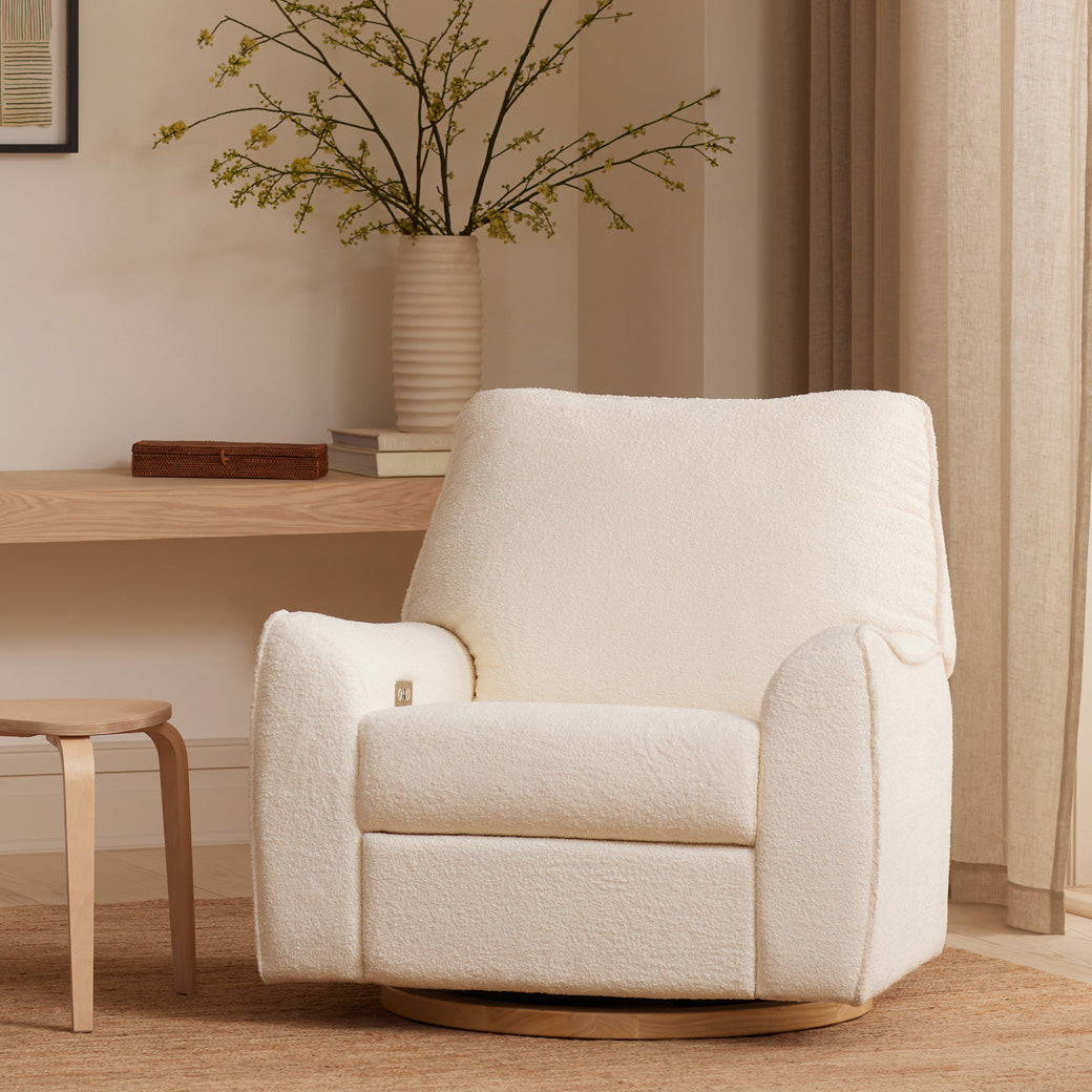 Nursery Works Sunday Power Recliner and Swivel Glider in a natural colored room in --Color_Chantilly Sherpa with Light Wood Base