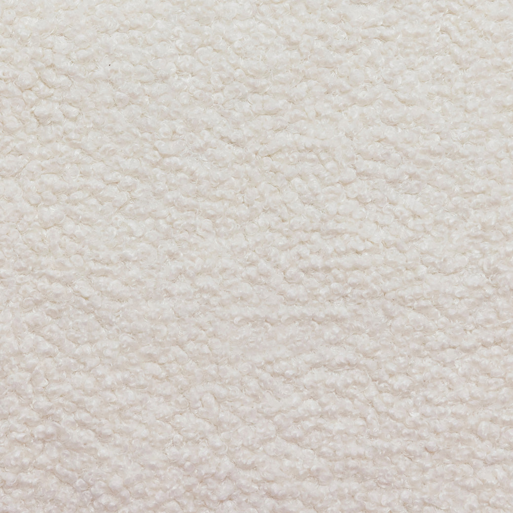 Closeup of Nursery Works Sunday Power Recliner and Swivel Glider pattern in --Color_Chantilly Sherpa with Light Wood Base 