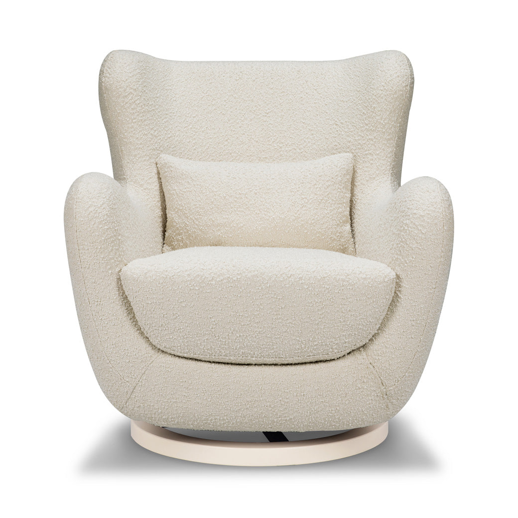 Front view of The Nursery Works Solstice Swivel Glider in --Color_Ivory Boucle with Ivory Wood Base