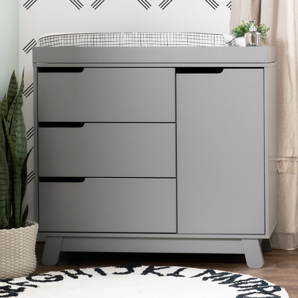 Lifestyle front view of The Babyletto Hudson Changer Dresser in -- Color_Grey