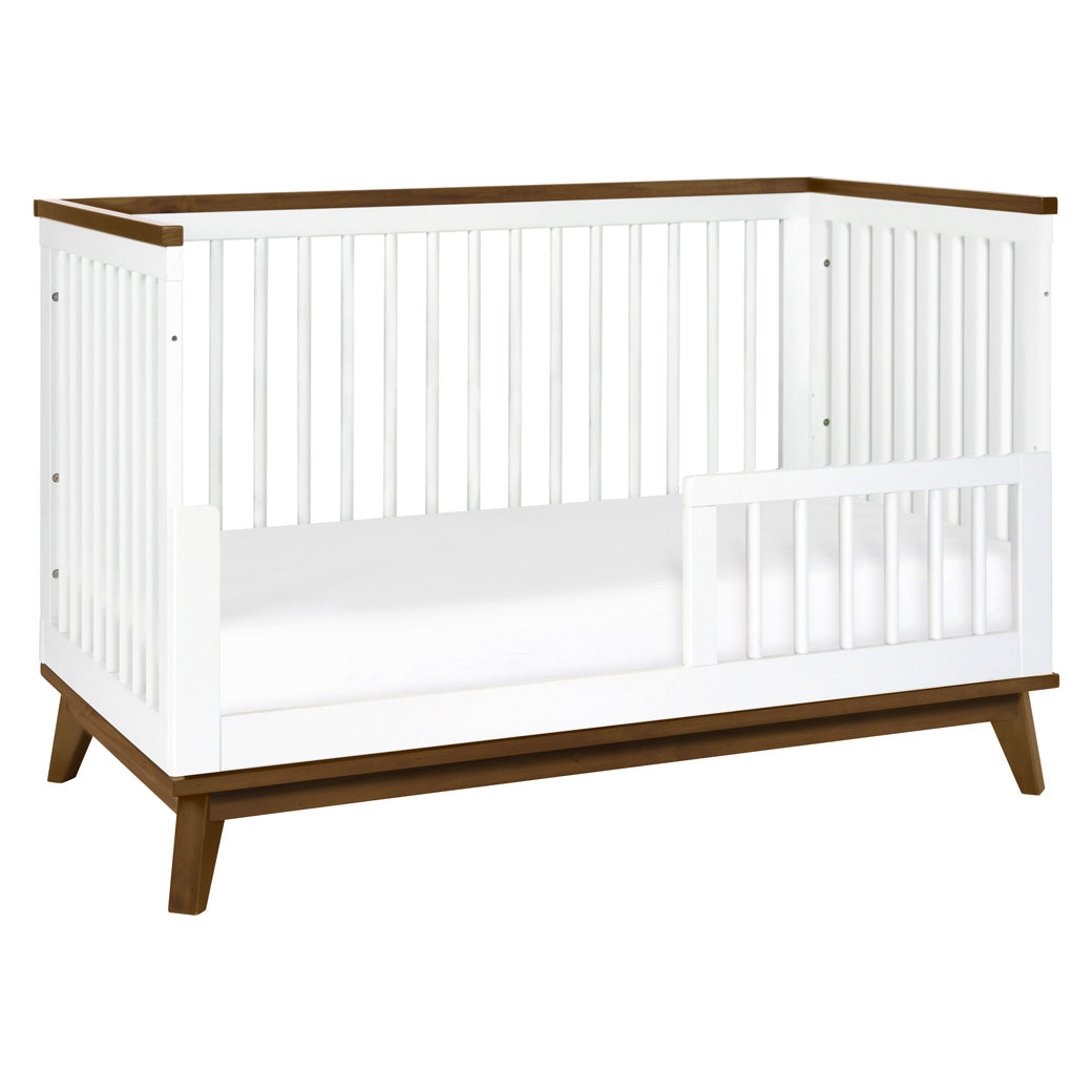 Babyletto's Scoot 3-in-1 Convertible Crib as toddler bed in -- Color_White/Natural Walnut