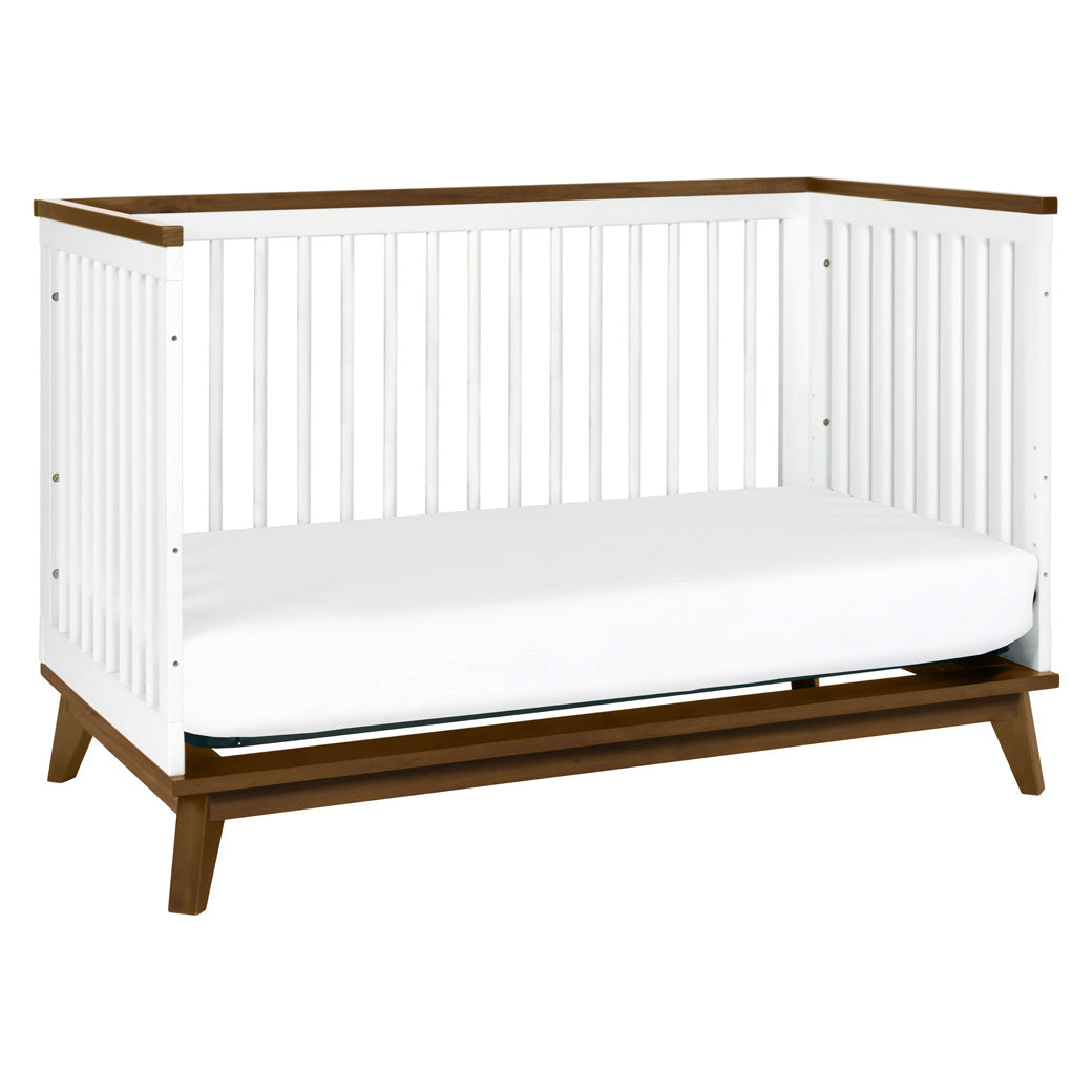 Babyletto's Scoot 3-in-1 Convertible Crib as daybed in -- Color_White/Natural Walnut