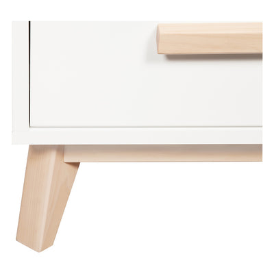 Closeup of leg of Babyletto's Scoot 3-Drawer Changer Dresser in -- Color_Washed Natural/White