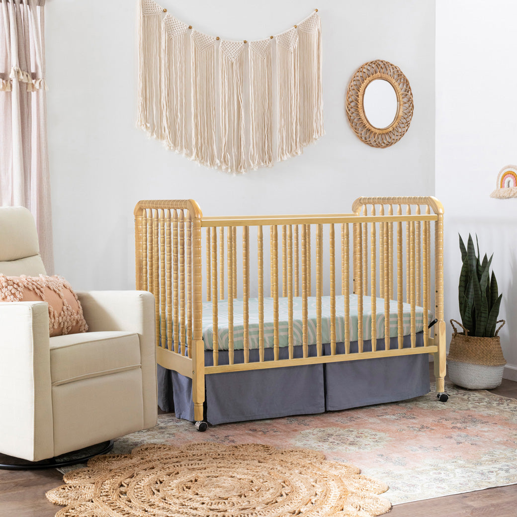 Lifestyle corner view of the DaVinci’s Jenny Lind Crib in -- Color_Natural