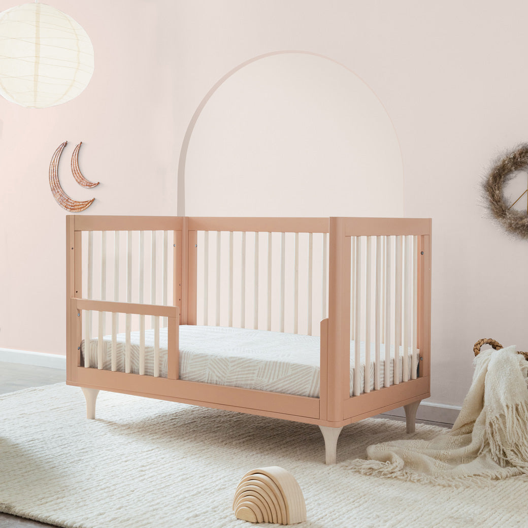 Babyletto Lolly 3-in-1 Crib as toddler bed in a nursery  in -- Color_Canyon