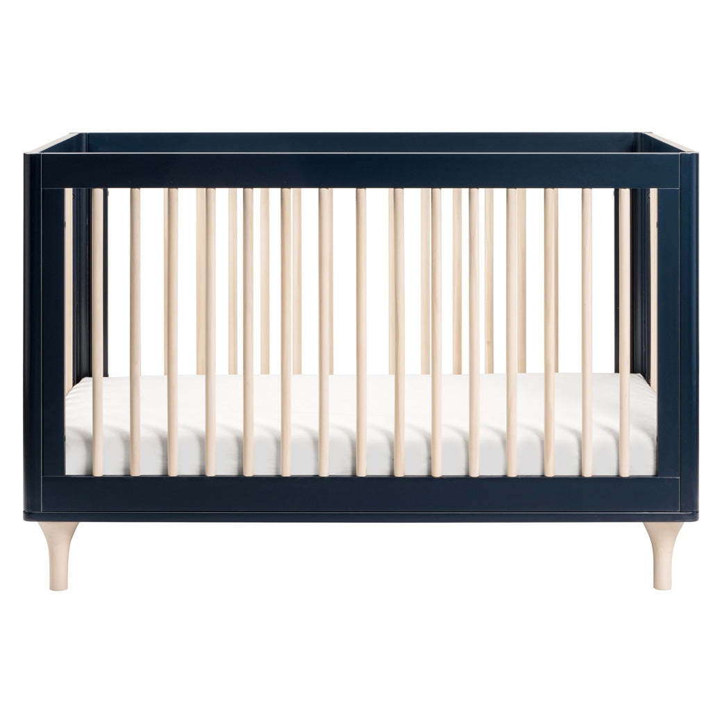 The front view of The Babyletto Lolly 3-in-1 Convertible Crib in -- Color_Navy