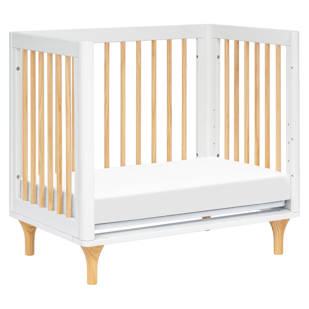 The Babyletto Lolly 4-in-1 Convertible Mini Crib as a day bed in -- Color_White / Natural