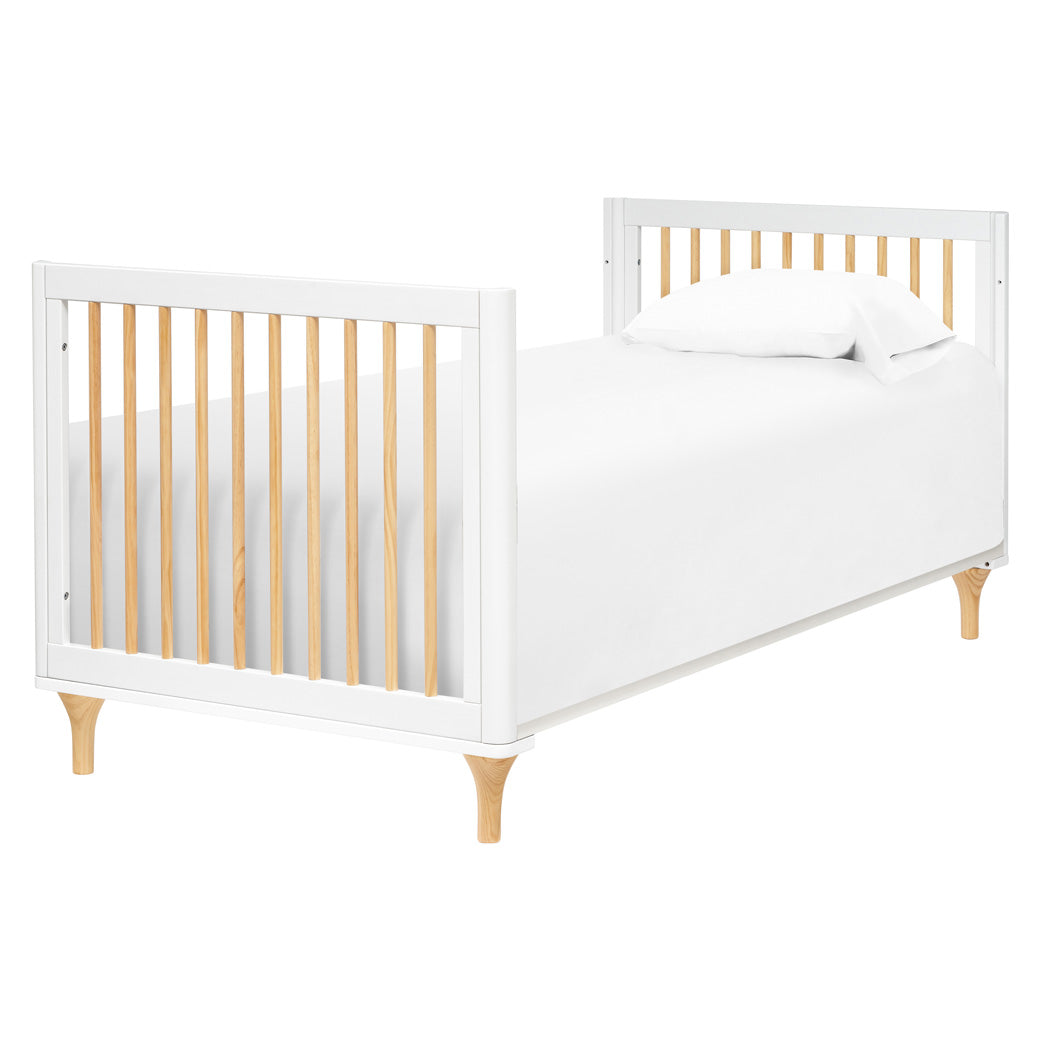 The Babyletto Lolly 4-in-1 Convertible Mini Crib as a bed in -- Color_White / Natural