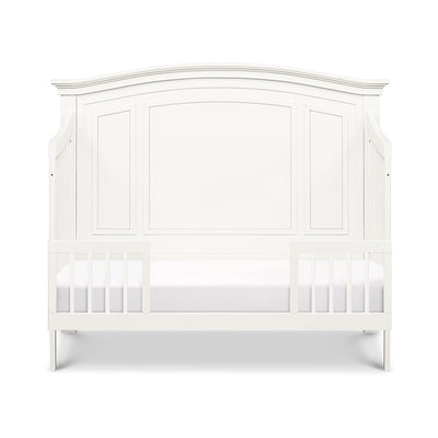 Front view of Namesake's Durham 4-in-1 Convertible Crib as toddler bed in -- Color_Warm White