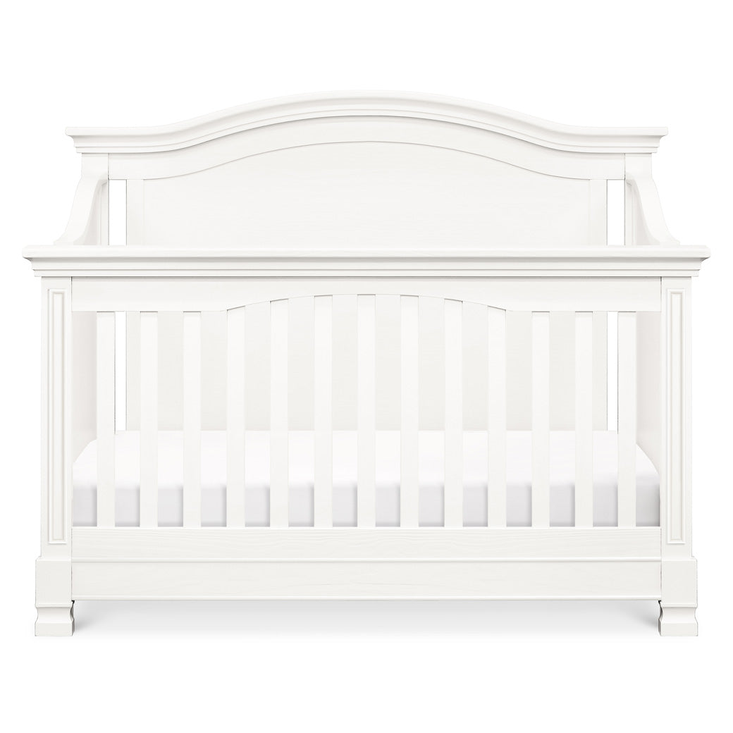 Front view of Namesake's Louis 4-in-1 Convertible Crib in -- Color_Warm White
