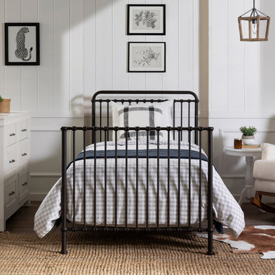 Front view of Namesake's Winston 4-in-1 Convertible Mini Crib as full-size bed in -- Color_Vintage Iron