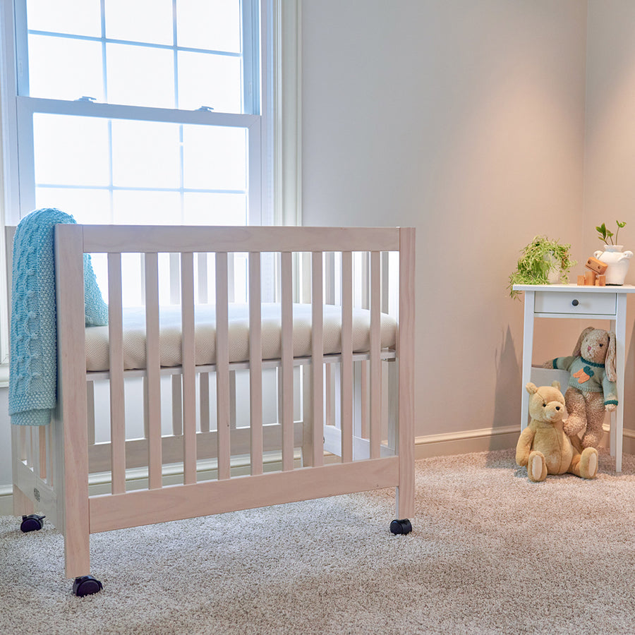 nursery what size mattress does a mini crib use