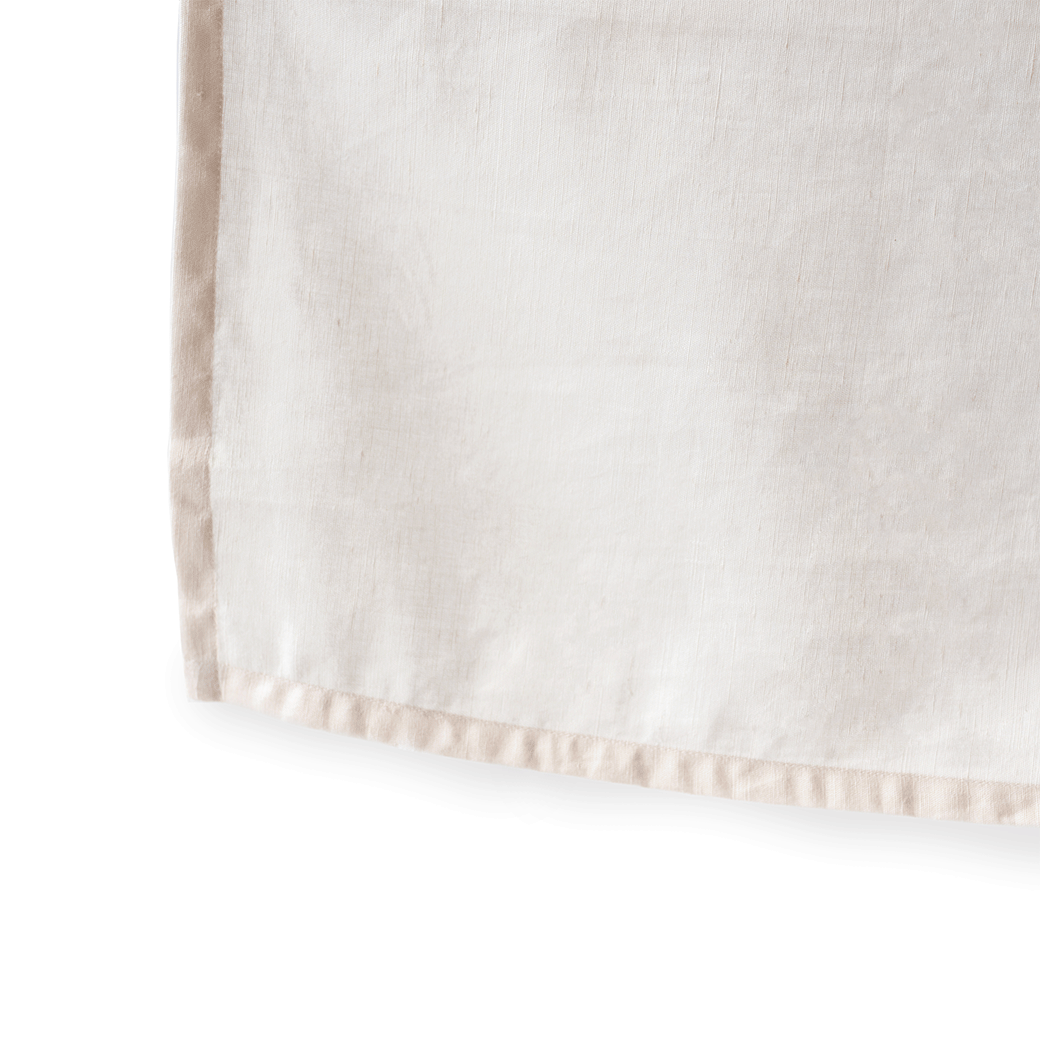 The Stokke Sleepi V3 Mini Bed Skirt by Pehr up close in -- Color_Blush