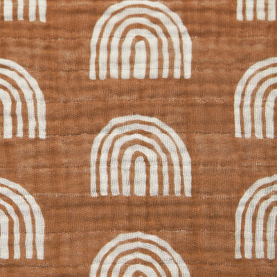 Closeup of pattern of Babyletto's All-Stages Midi Crib Sheet In GOTS Certified Organic Muslin Cotton in -- Color_Terracotta Rainbow