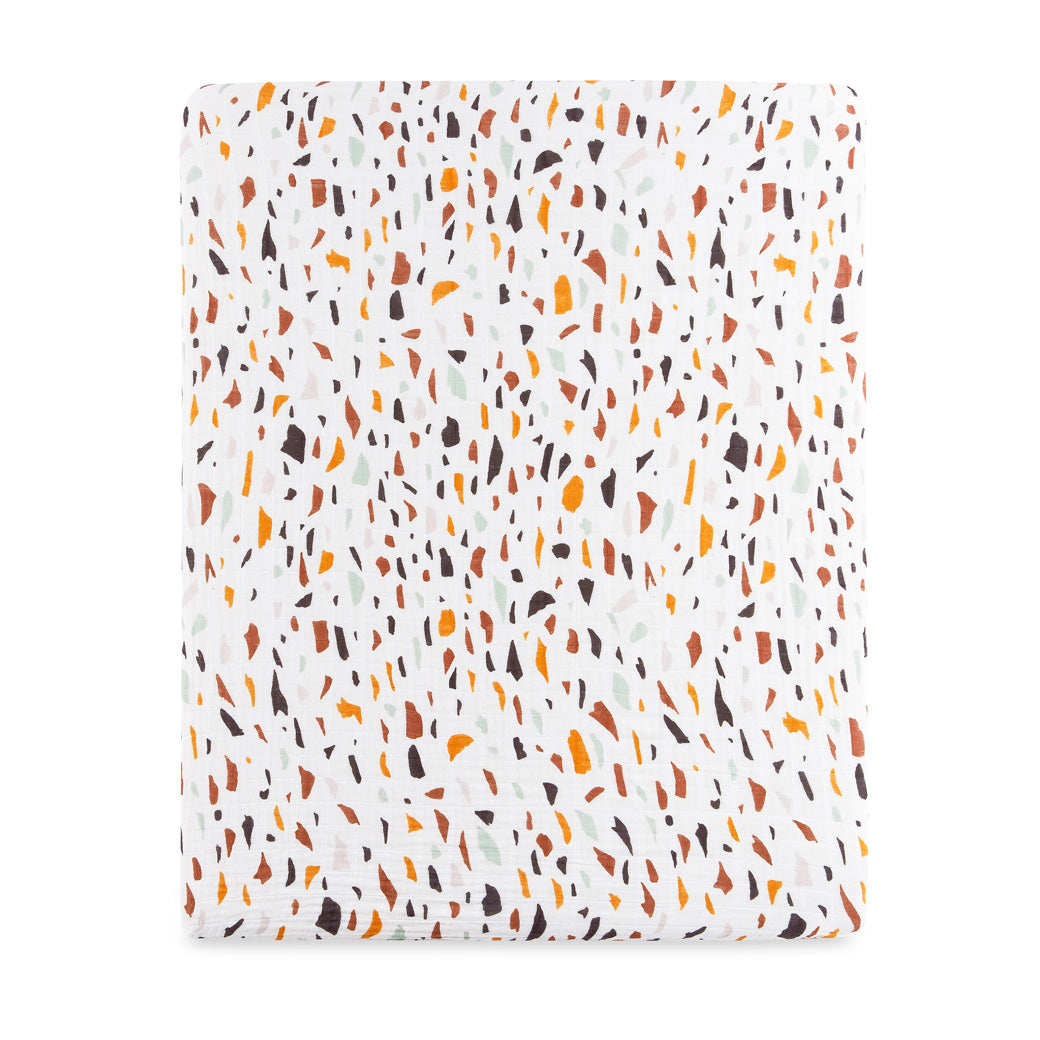 Front view of Babyletto's All-Stages Midi Crib Sheet In GOTS Certified Organic Muslin Cotton in -- Color_Terrazzo