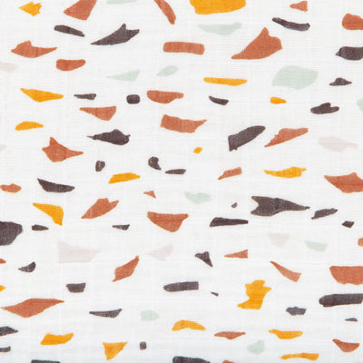 Closeup of the pattern of the Babyletto's Crib Sheet in GOTS Certified Organic Muslin Cotton in -- Color_Terrazzo