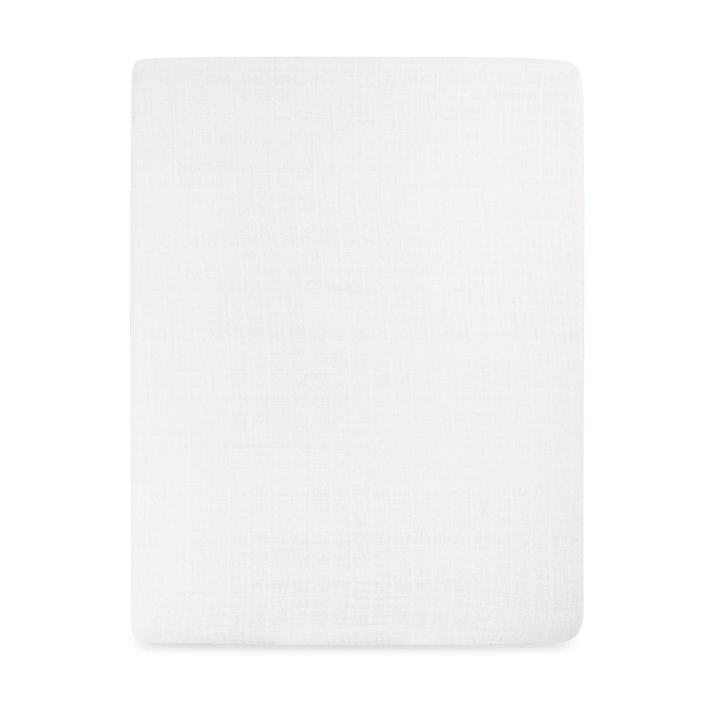 Front view of Babyletto's All-Stages Midi Crib Sheet In GOTS Certified Organic Muslin Cotton in -- Color_White