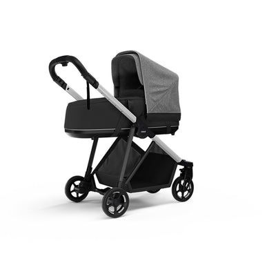 Side view of the Thule Shine Bassinet on the Thule Shine Stroller in Grey Melange