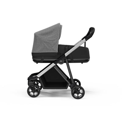 Side view of the Thule Shine Bassinet on the Thule Shine Stroller in -- Color_Grey Melange