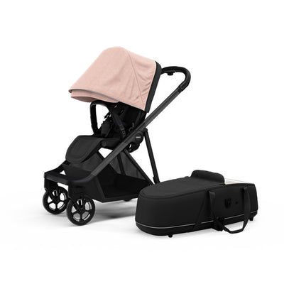 Side view of the Thule Shine Stroller in -- Color_Misty Rose with the Thule Shine bassinet