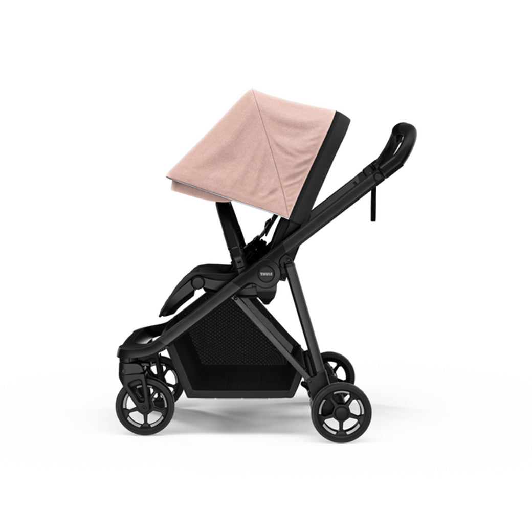 Side view of the Thule Shine Stroller in -- Color_Misty Rose
