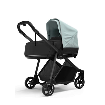 Side view of the Thule Shine Bassinet on the Thule Shine Stroller in -- Color_Alaska