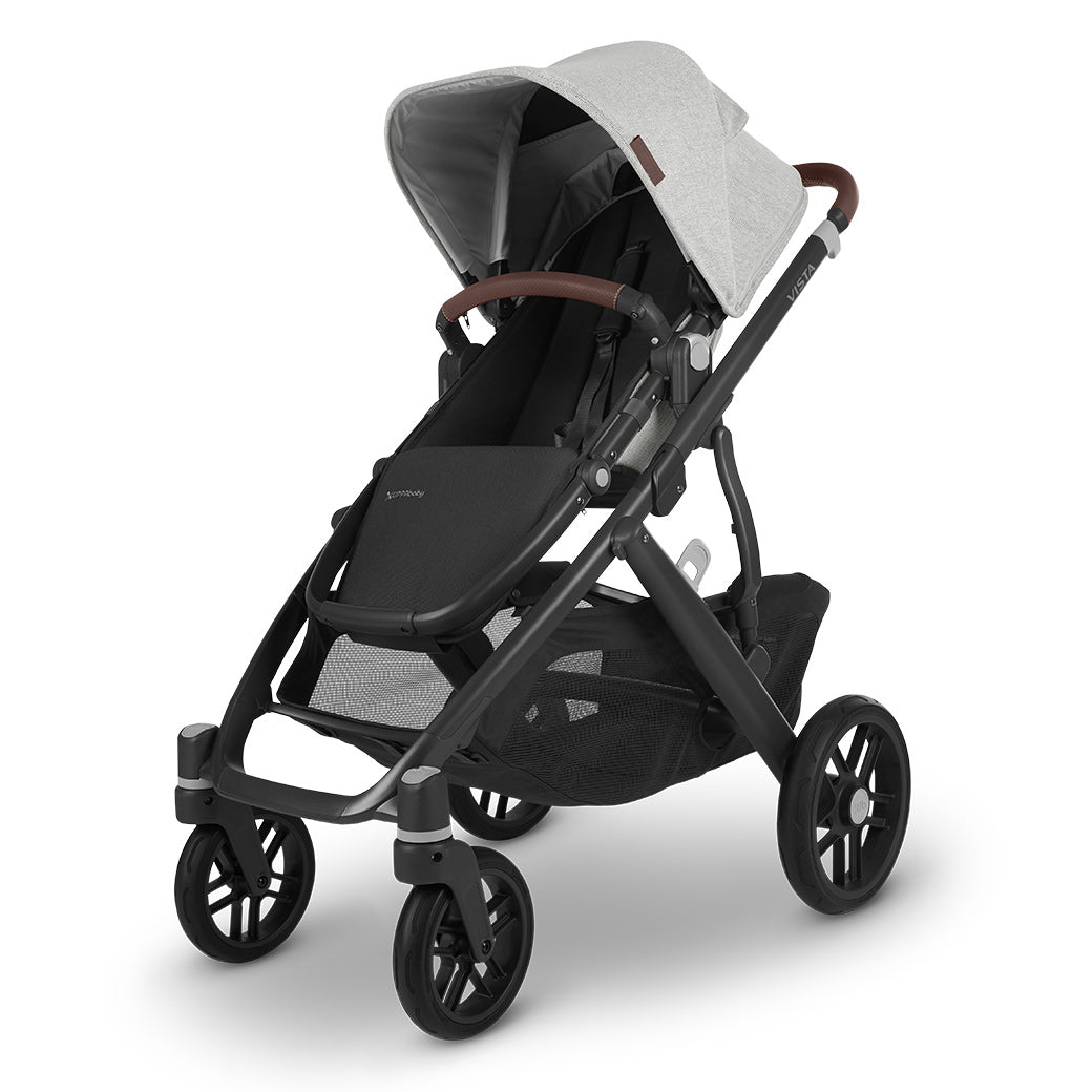The half extended sunshade on right side view of the uppababy vista v2 stroller -- Color_Anthony