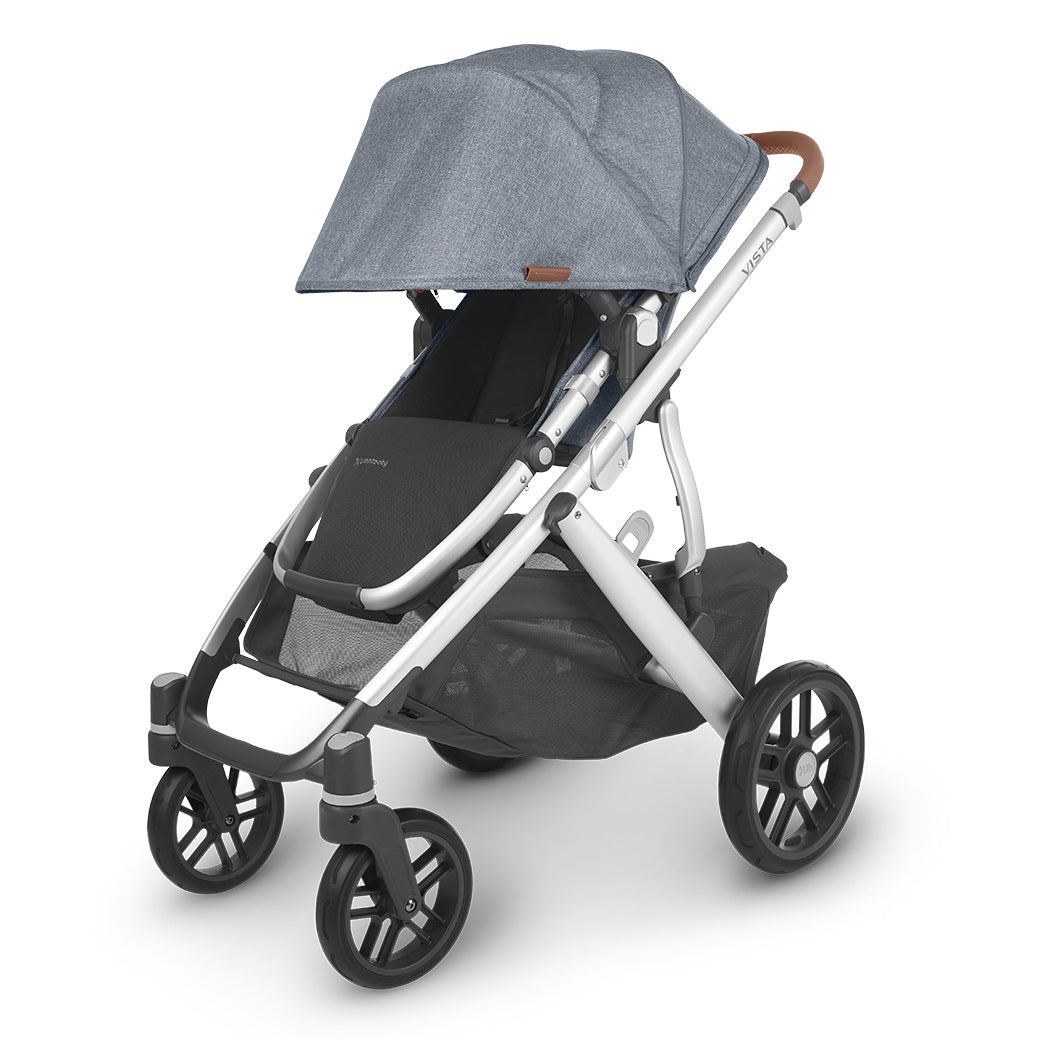 The extended sunshade on right side view of the uppababy vista v2 stroller -- Color_Gregory