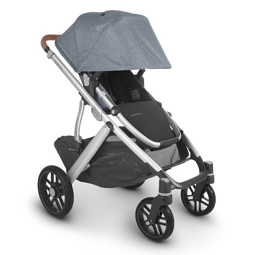 The extended sunshade on left side view of the uppababy vista v2 stroller -- Color_Gregory