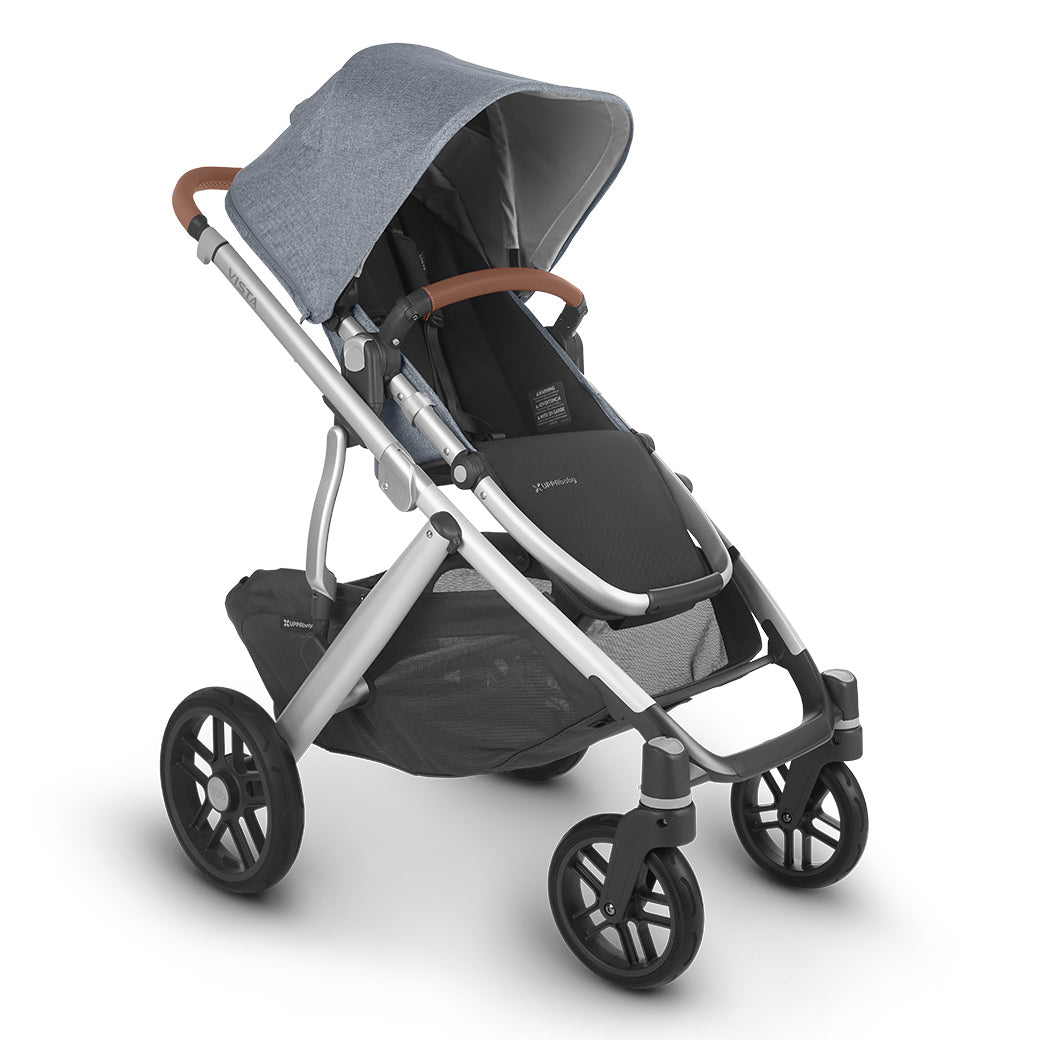 The half extended sunshade on the left side view of uppababy vista v2 stroller -- Color_Gregory