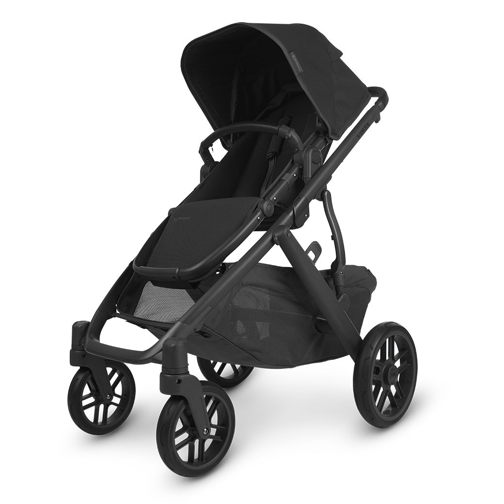 The half extended sunshade on right side view of the uppababy vista v2 stroller -- Color_Jake