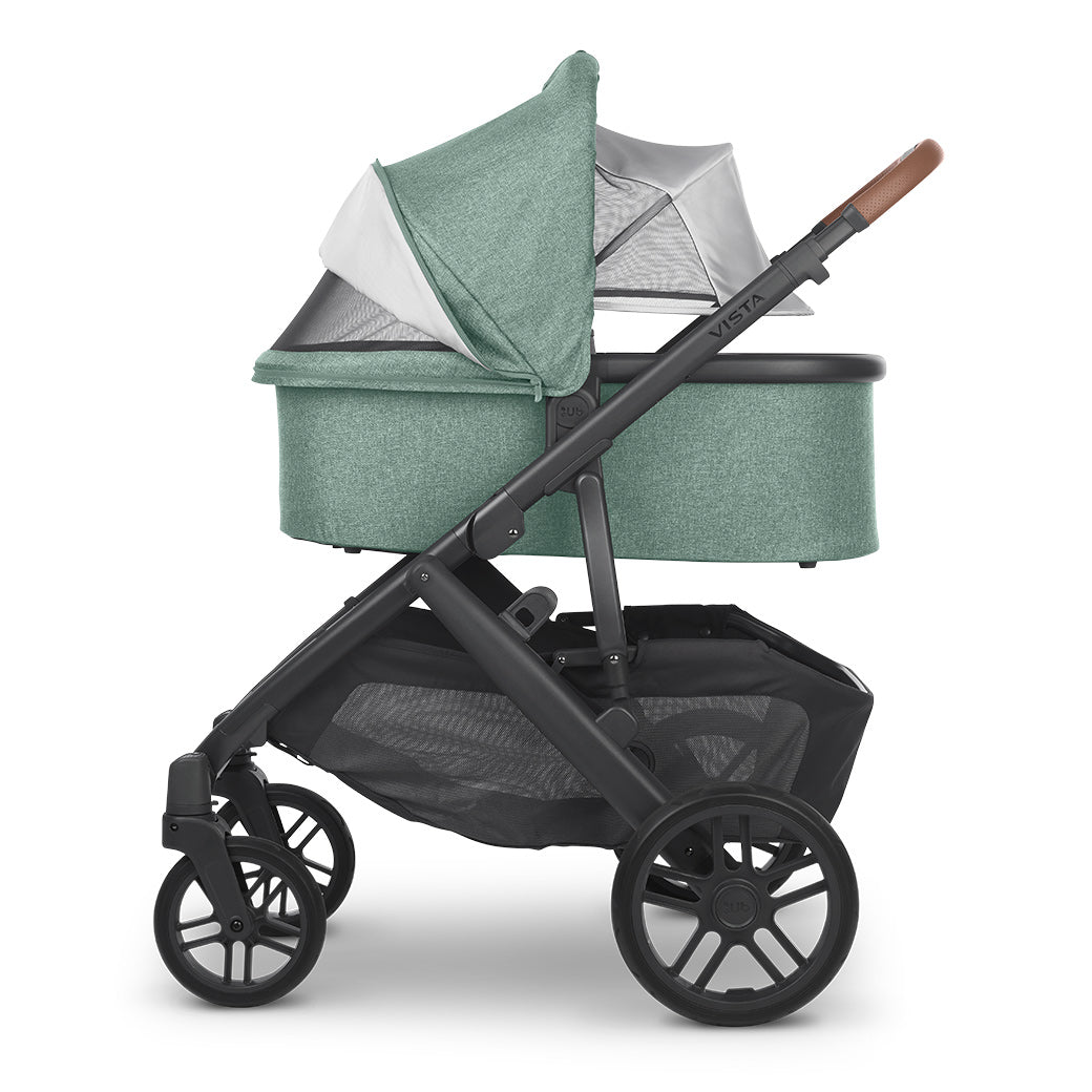 Side view of UPPAbaby Bassinet with the canopy down and extended  in -- Color_Gwen