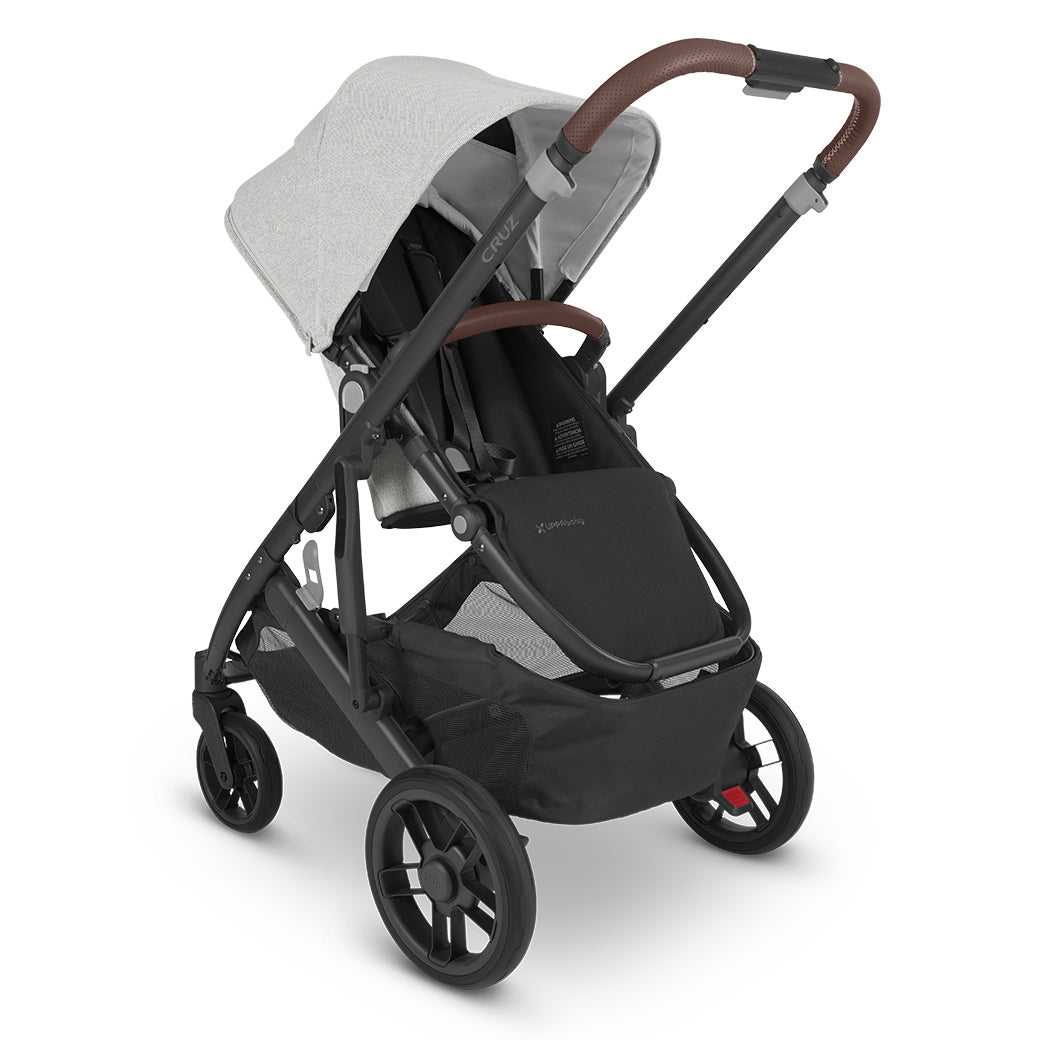 Parent-facing configuration of UPPAbaby CRUZ V2 Stroller, angled slightly to the right with black frame and grey chenille fabric -- Color_Anthony