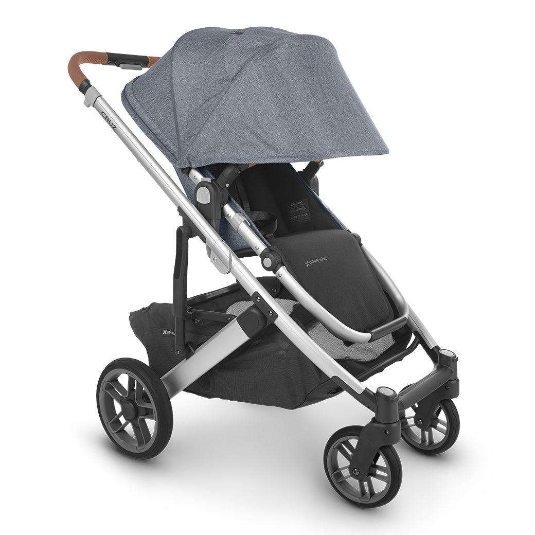 A side view of UPPAbaby CRUZ V2 Stroller with grey shade extended -- Color_Gregory