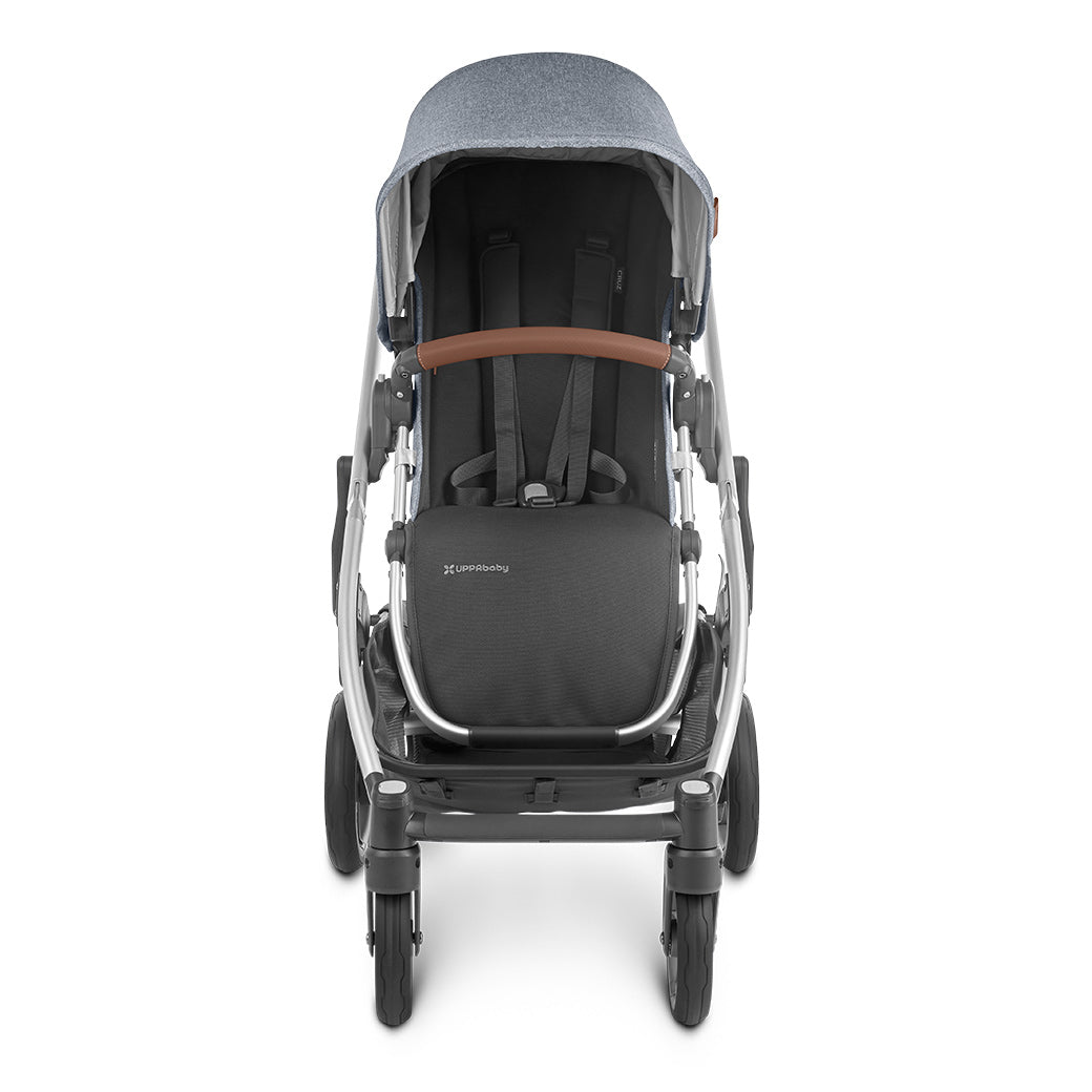 Front view of front-facing uppababy cruz v2 stroller in bluish gray and black -- Color_Gregory