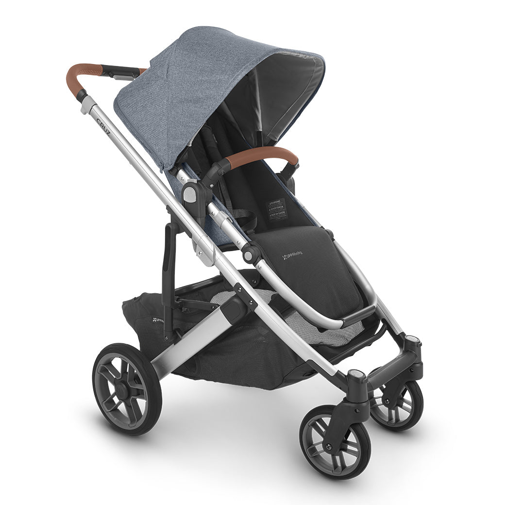 Slightly right-facing view of the UPPAbaby CRUZ V2 Stroller in bluish gray and black -- Color_Gregory