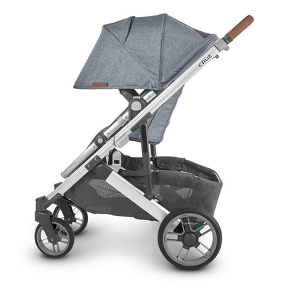 Profile view of the extended sunshade on the CRUZ V2 stroller in -- Color_Gregory