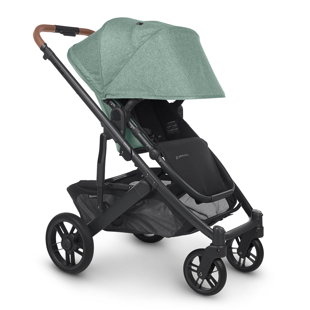 UPPAbaby CRUZ V2 Stroller facing right with the shade down in green -- Color_Gwen