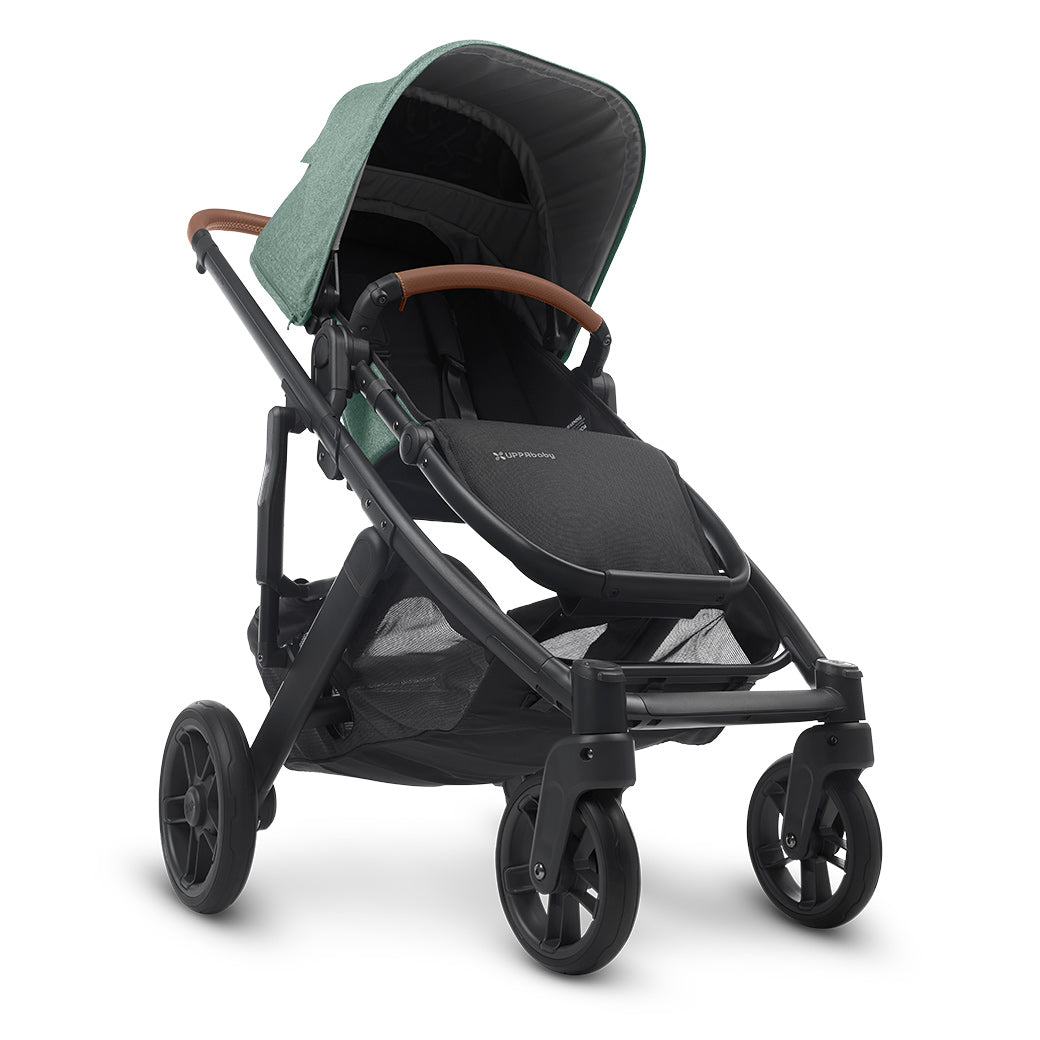Side view of UPPAbaby CRUZ V2 Stroller with black frame and matcha green fabric -- Color_Gwen