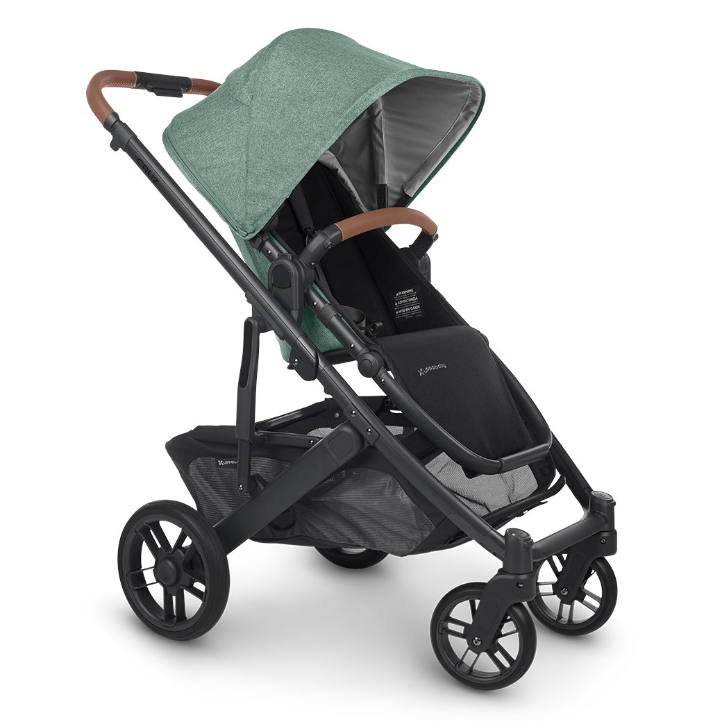 UPPAbaby CRUZ V2 Stroller  with black frame and matcha green fabric facing right -- Color_Gwen