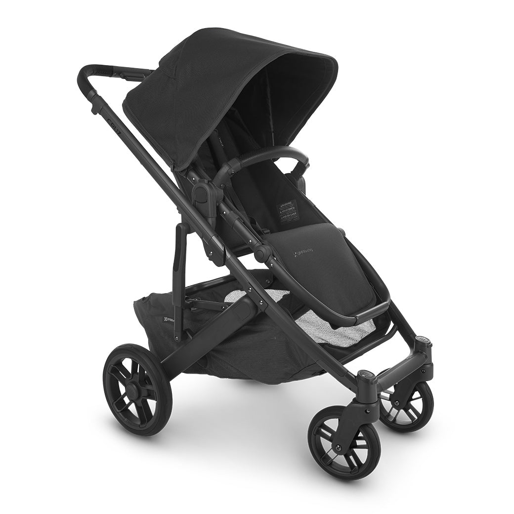 The half extended sunshade on the left side view of uppababy CRUZ V2 stroller -- Color_Jake