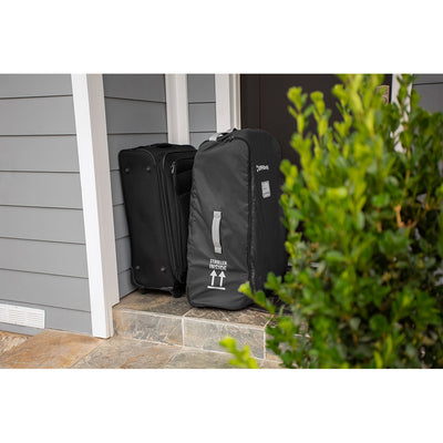 UPPAbaby CRUZ V2 Stroller travel back in front of a house